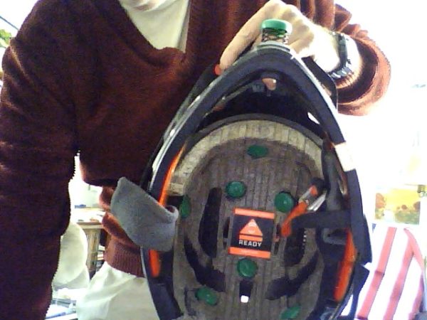 Capped wave springs in Styrofoam liner type helmets